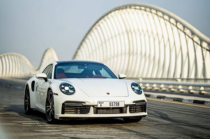 Аренда Porsche 911 Turbo S White в Дубае - фото 5