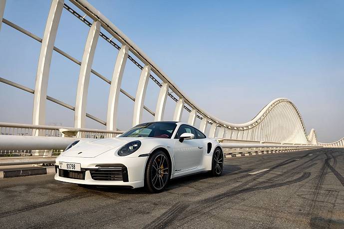 Аренда Porsche 911 Turbo S White в Дубае - фото 10