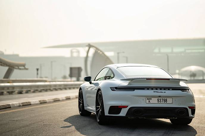 Аренда Porsche 911 Turbo S White в Дубае - фото 13